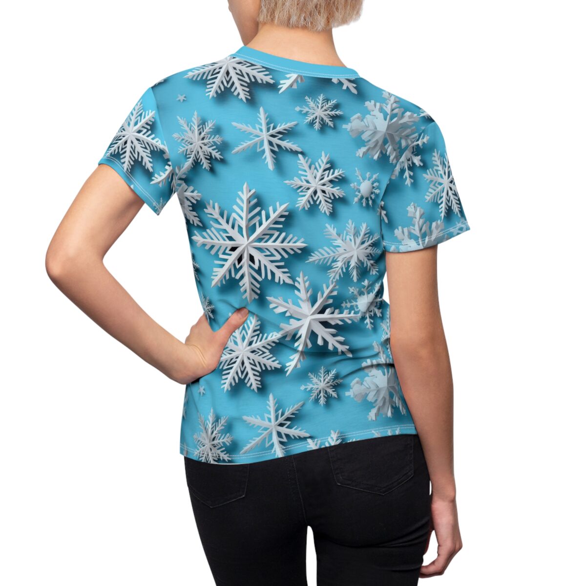 Blue sublimation tee with white all over print snowflakes, seamless wrap around winter graphic.