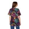 Vibrant purples, greens, blues, and reds depict an array of succulents, filling this oversized full print tee, with a dark background accentuating the floral designs.