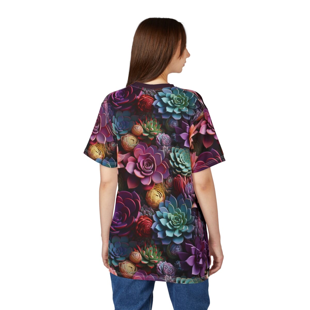Vibrant purples, greens, blues, and reds depict an array of succulents, filling this oversized full print tee, with a dark background accentuating the floral designs.