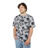 This t-shirt showcases an all over print featuring a textured background with a repeating pattern of black floral vines.