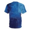 All over print t-shirt featuring an abstract, textured design in various shades of blue, reminiscent of brush strokes. The seamless print wraps around the garment.