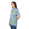 Blue stripes and white daisies with cute yellow and blue cat faces cover this full print shirt.
