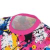 Splashes of pink, blue, yellow, and black on a white background cover this oversized full print tee, with abstract paint splatters forming a dynamic visual.