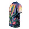A t-shirt with a vibrant print of an angelic figure with rainbow wings standing by a serene body of water, surrounded by lush foliage, colorful flowers, and a surreal, sunlit forest backdrop.