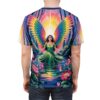 Back view of a t-shirt featuring a vibrant illustration of an angel with large, rainbow-colored wings sitting in a serene forest lake. The angel wears a flowing green dress and is surrounded by lush greenery and blooming pink flowers, with a surreal sunrise in the background.