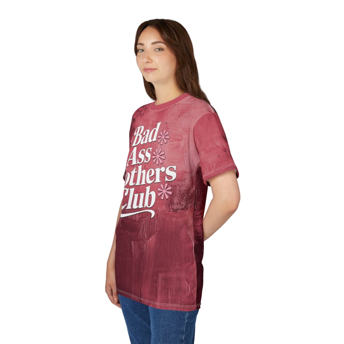 This all over print sublimation tee features white text that reads 'Bad Ass Mothers Club' with pink floral accents.