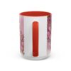 "Best Mom Ever" ceramic mug with a pink floral and gold accent design, featuring a white body and a red handle and interior.