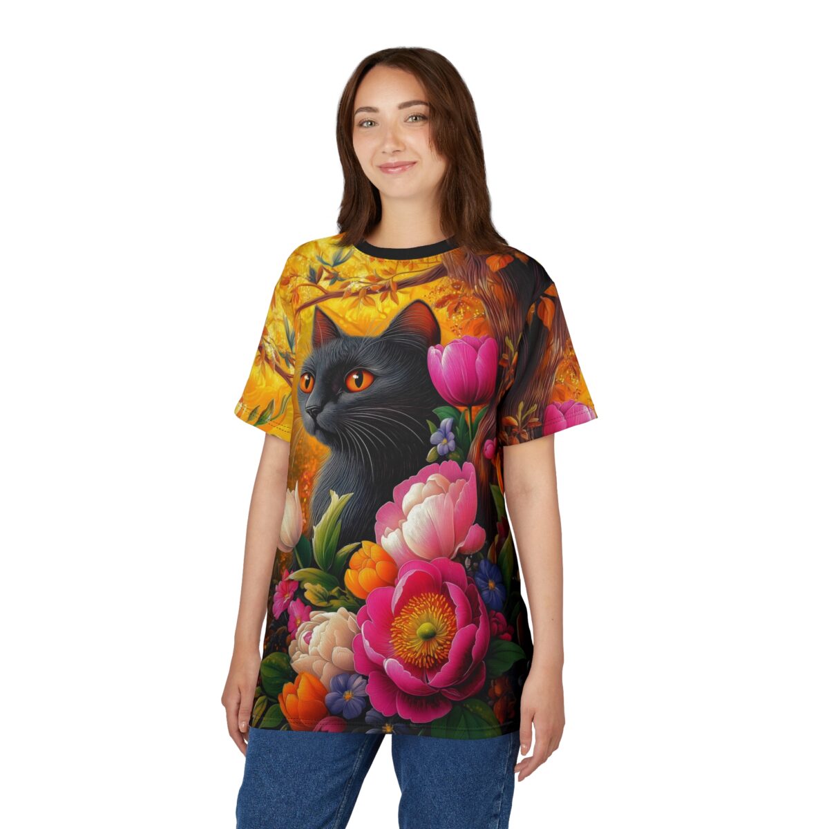 All over print sublimation tee featuring a black cat surrounded by vibrant pink and orange flowers, with a warm autumn forest background.