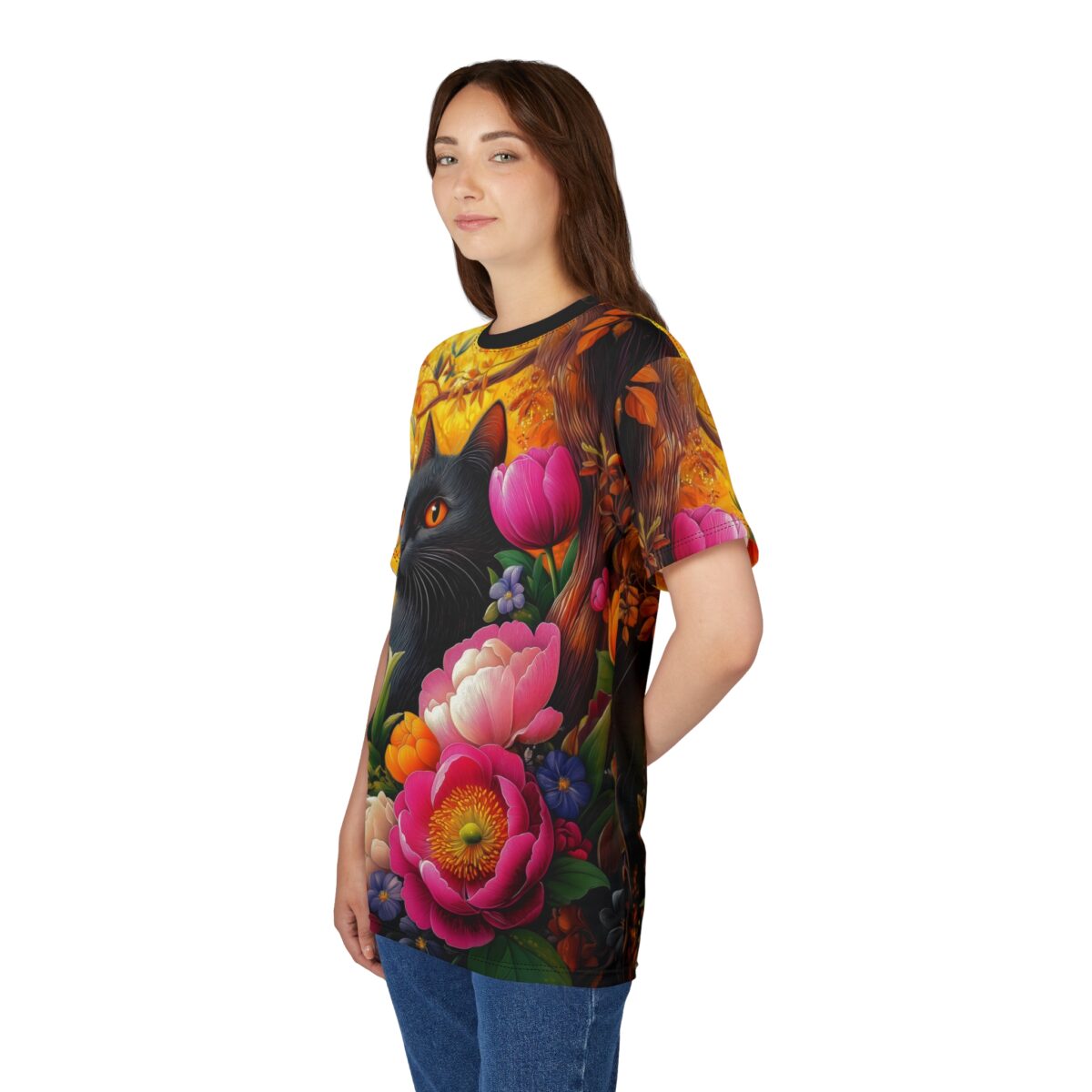 Vibrant yellows, oranges, and pinks, with a black cat and lush floral blooms, cover this 3D graphic t-shirt, set against a backdrop of stylized trees and leaves.