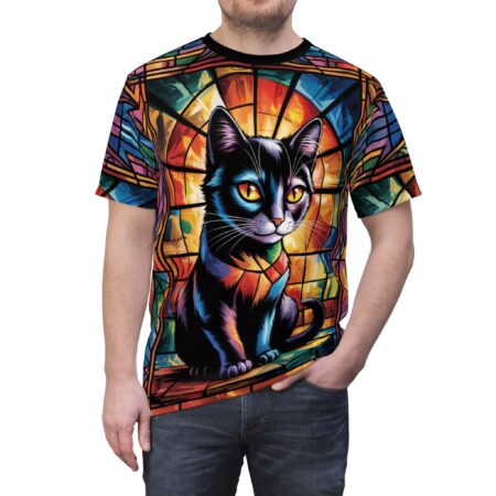 Vibrant geometric stained glass patterns in reds, oranges, blues, and greens cover this t-shirt, depicting a striking black cat with yellow eyes.