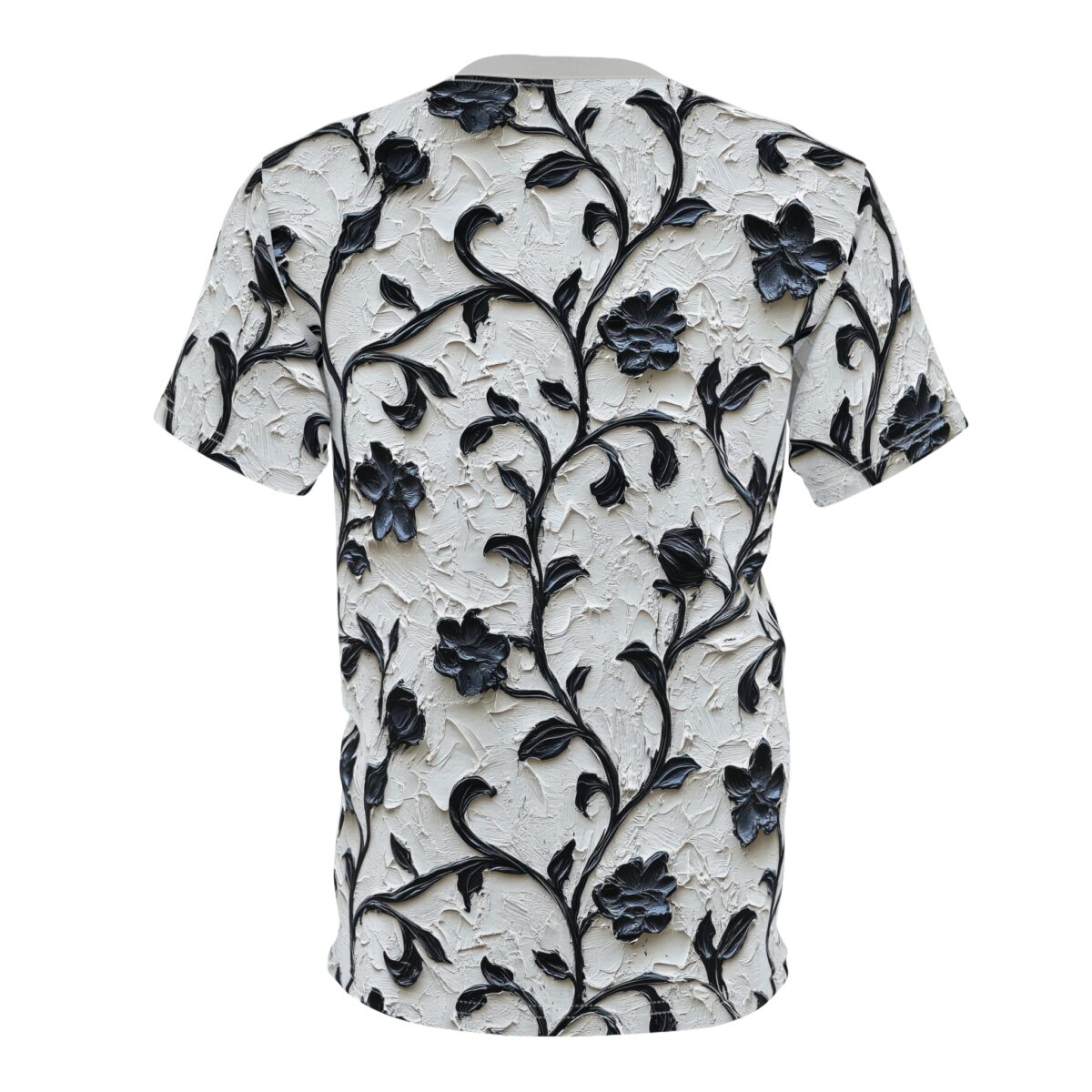 Black floral vines and flowers with glossy texture cover this textured white background shirt.