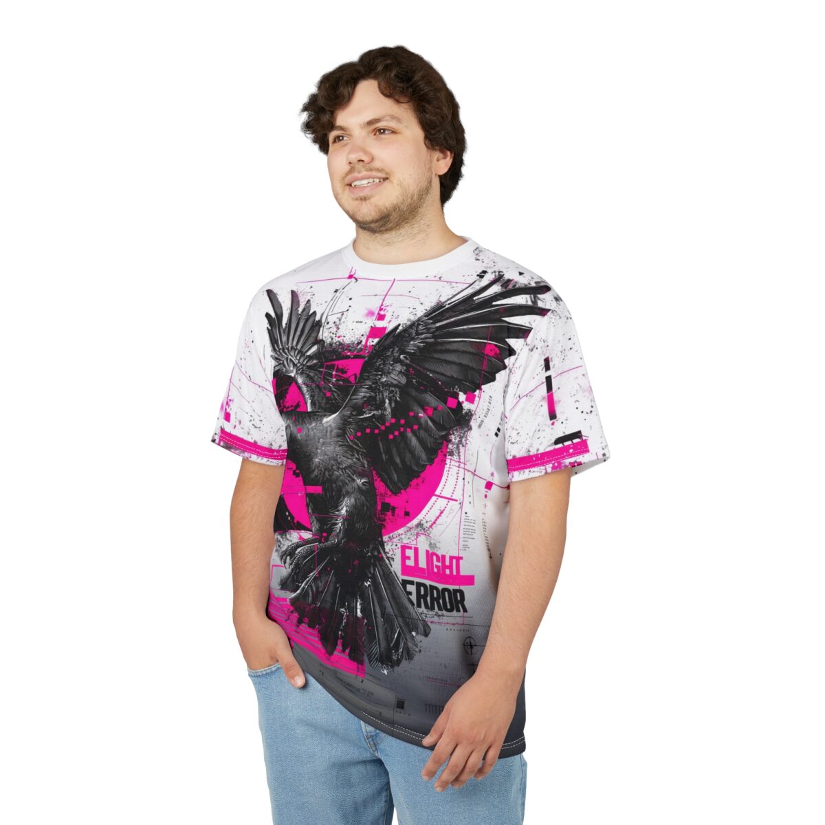 Black, pink, and white graphic elements cover this seamless pattern tee, depicting a raven with outstretched wings against a circular background and abstract geometric designs.