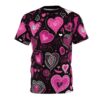 Pink and white hearts, swirls, and doodles cover this all over print t-shirt, with a black background and various heart designs.