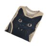 Black cat face with wide eyes and fangs on a beige background with text patterns and splatters.