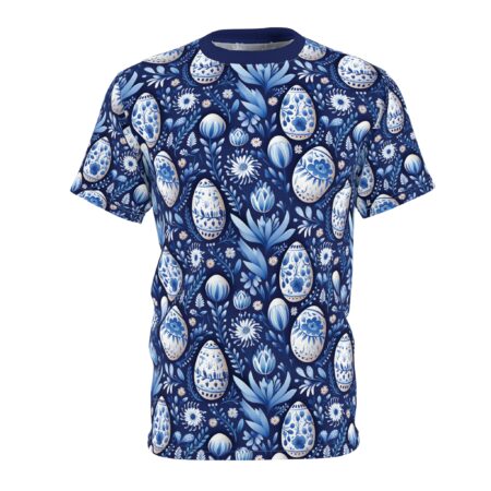 White and blue ornate Easter eggs and blooming flowers cover this dark blue patterned tee shirt, with floral stems and leaves.