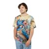 Blue, brown, and pink floral patterns cover this oversized full print tee, depicting a vibrant blue jay amidst blooming flowers.