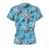 All over print sublimation tee with a seamless wrap around graphic of white 3D snowflakes on a bright blue background.