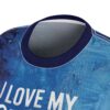 Blue textured brushstroke patterns cover this all over print apparel, showcasing distressed white typography.