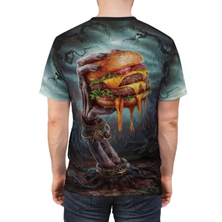 Dark greens, browns, and grays cover this full print shirt, showing a skeleton hand holding a dripping burger in a spooky forest.
