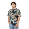 Teal and navy butterflies with cream and tan floral accents cover this graphic streetwear tee, showcasing a detailed nature-inspired pattern.