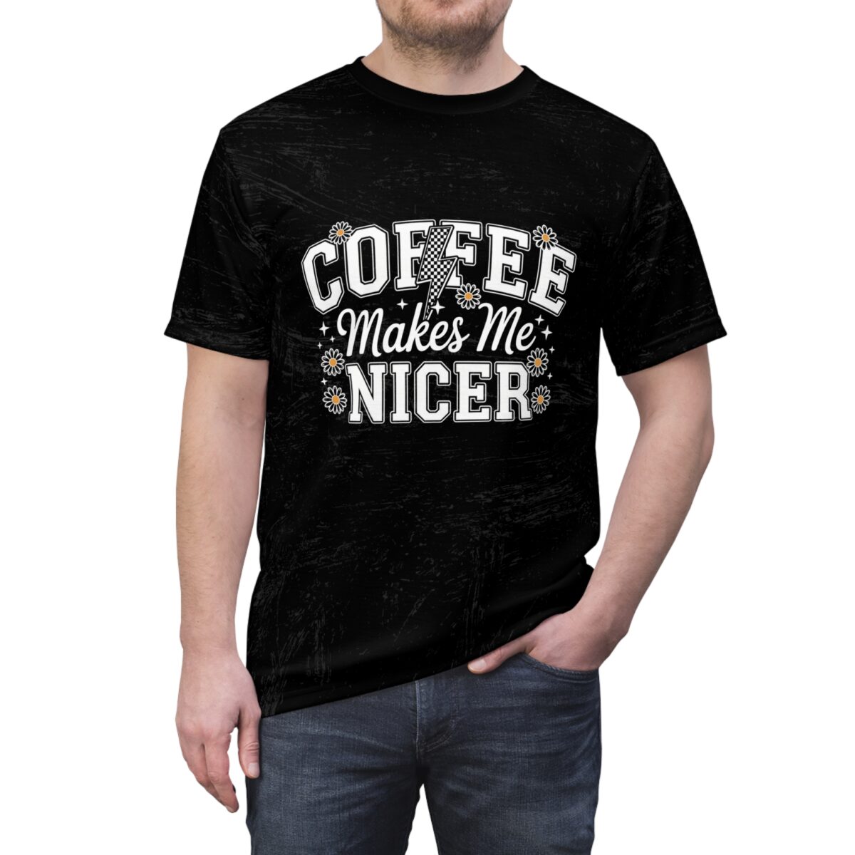 Black t-shirt with white text 'COFFEE MAKES ME NICER' and daisy graphics. Features a checkerboard lightning bolt.