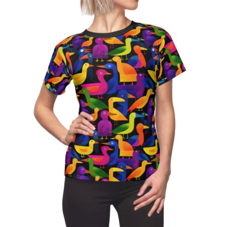 Women's all over print sublimation tee with a vibrant, seamless pattern of colorful birds on a black background.