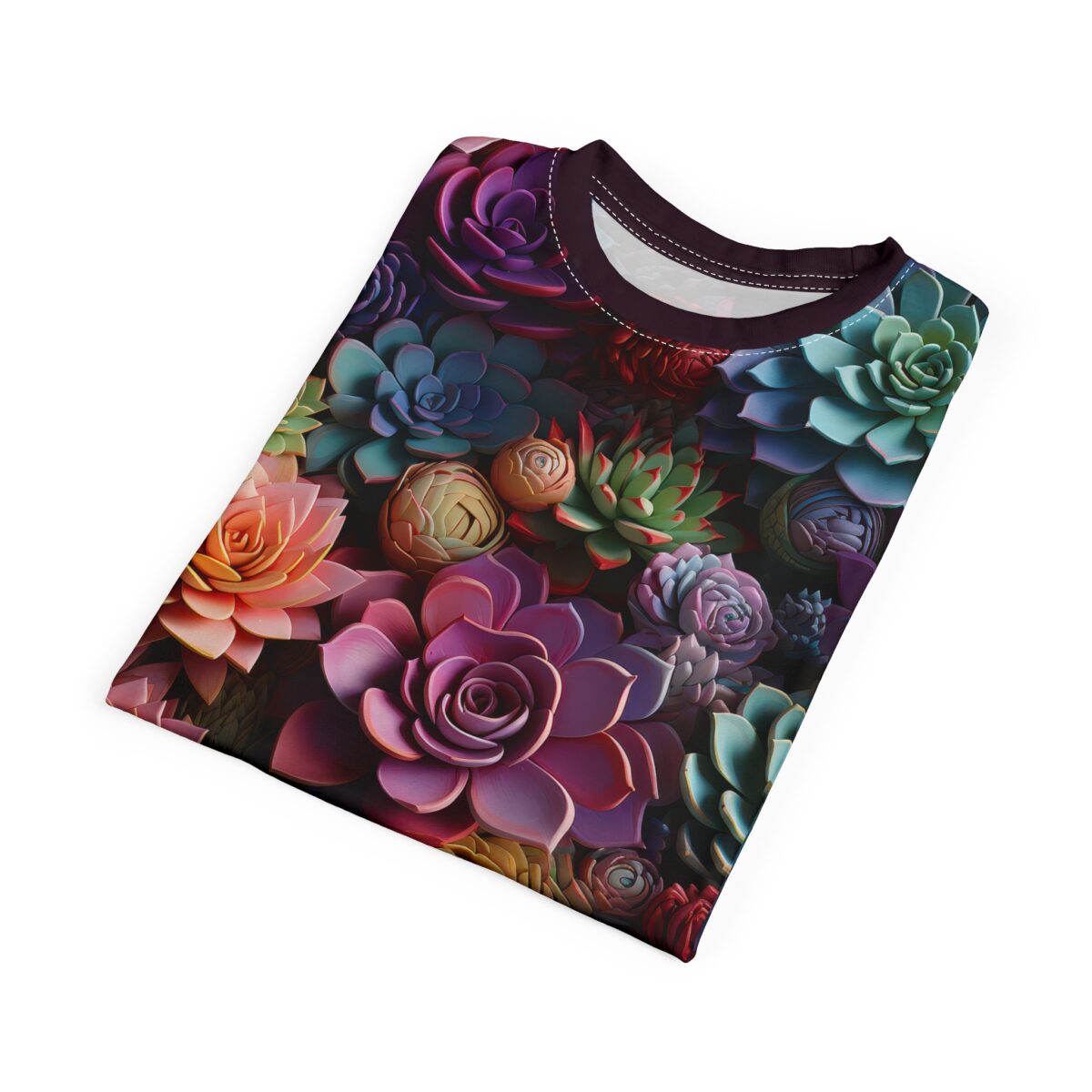 Vibrant all over print sublimation tee showcases a colorful arrangement of assorted succulents in pink, purple, teal, and orange hues.