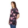 Woman wearing a t-shirt printed with pink and black cartoon bats