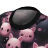 Cute pink bunny sublimation tee featuring a seamless all-over print with kawaii character faces and dark elements.