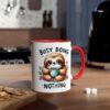 White ceramic mug with a cartoon sloth holding a polka dot cup, red handle and rim.