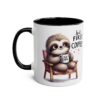 White ceramic mug with black interior and handle, featuring a cartoon sloth sitting in a chair, holding a coffee cup.