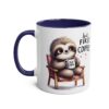 White ceramic mug with blue handle and rim, featuring a cute sloth holding a coffee cup.