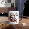 White ceramic mug with a cute sloth illustration, purple handle, and "but first coffee" text.