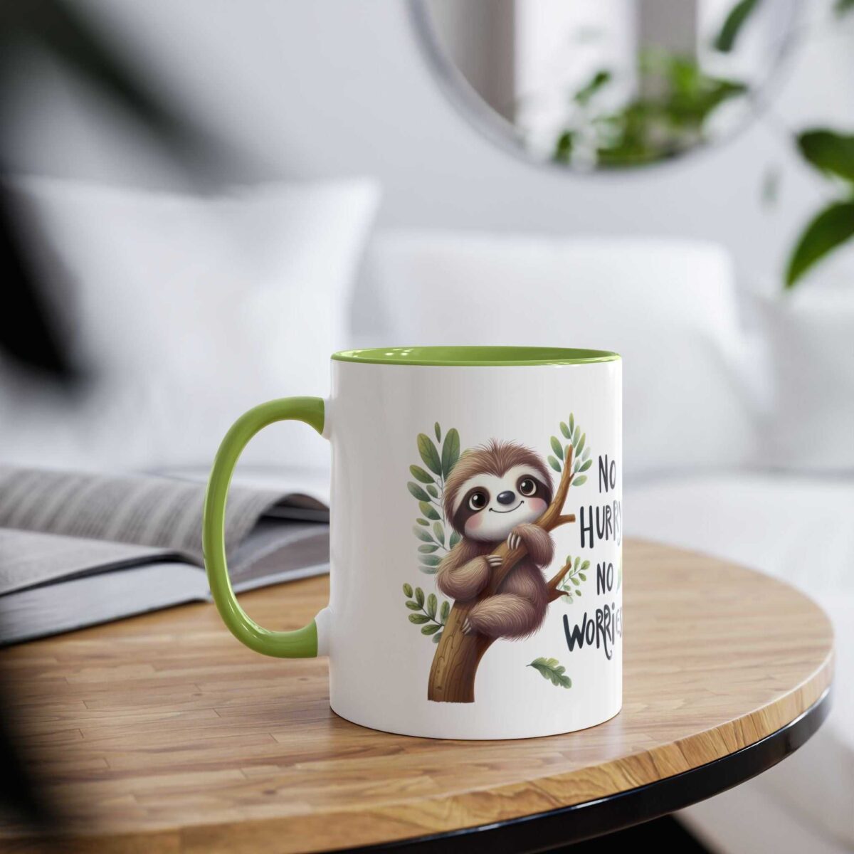 White ceramic mug with a green rim and handle, featuring a cute sloth hanging from a branch with the text "No Hurry, No Worry".