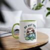 White ceramic mug with green handle and rim, featuring a sleeping sloth on a turtle with "NO NOT TODAY" text.
