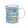 A white ceramic mug with a blue striped pattern, decorated with cute cartoon cats and daisies.