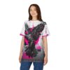 Black and hot pink geometric shapes and text overlay a detailed graphic of a raven mid-flight on this tee.