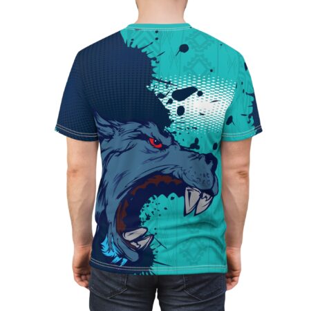 Teal and dark blue patterns, including tribal designs and splatter effects, cover this patterned tee shirt, featuring a fierce wolf's head with red eyes.
