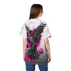 This all over print t-shirt features a cyber grunge aesthetic with a detailed black raven and pink geometric accents.