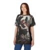 Dark blues, greys, and creams depict an angel holding a maiden in a gothic castle setting on this seamless pattern tee.