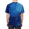 Back view of a man wearing a t-shirt with a dark blue abstract textured pattern.