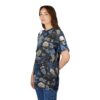 Dark blue, grey, and cream floral patterns with skulls and flowing drapery cover this sublimation graphic tee.