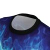 Crewneck t-shirt in dark blue with a dynamic print of electric blue swirls and wisps across the fabric.