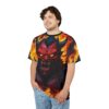All over print t-shirt featuring a fierce red demon face with glowing yellow eyes and horns, surrounded by intense fire graphics.