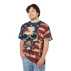 A person with curly hair wears a distressed American flag t-shirt featuring a grunge skull graphic on a white background.
