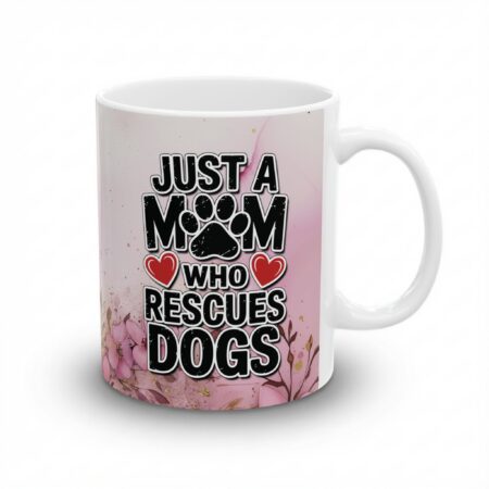 Graphic mug with text 'Just A Mom Who Rescues Dogs' and floral accents. Perfect gift for dog lovers.