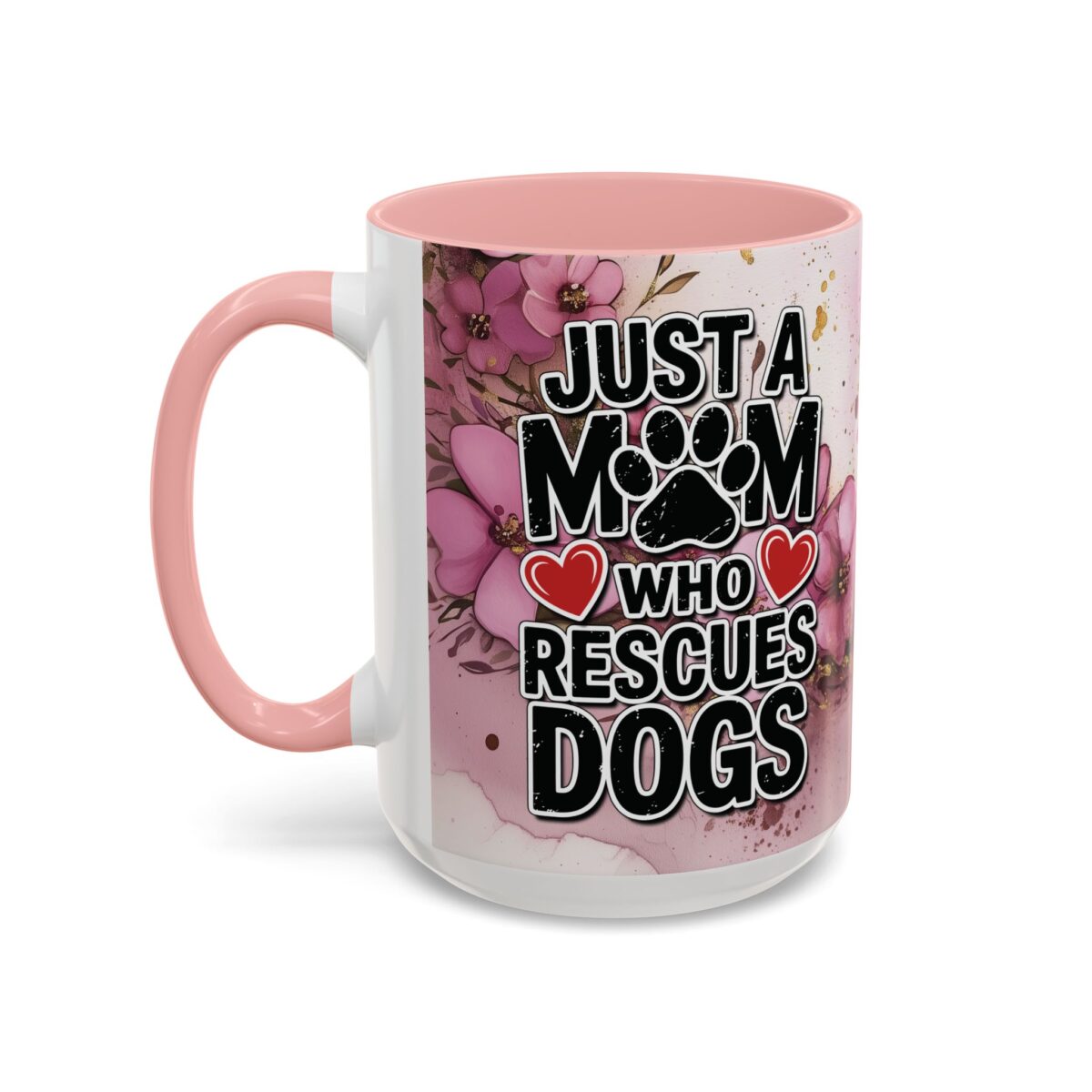 White coffee mug with pink handle and interior, featuring 'Just a Mom Who Rescues Dogs' text and floral graphics.