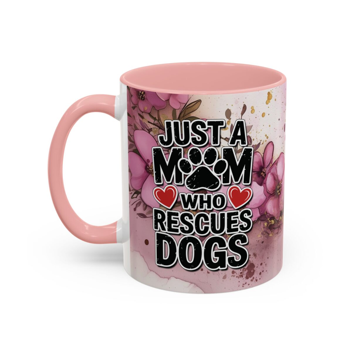 Ceramic coffee mug with pink handle, featuring the text 'JUST A MOM WHO RESCUES DOGS' surrounded by floral watercolor graphics.