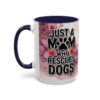 White ceramic mug with pink floral watercolor design, featuring text 'Just A Mom Who Rescues Dogs' with paw print and heart accents.