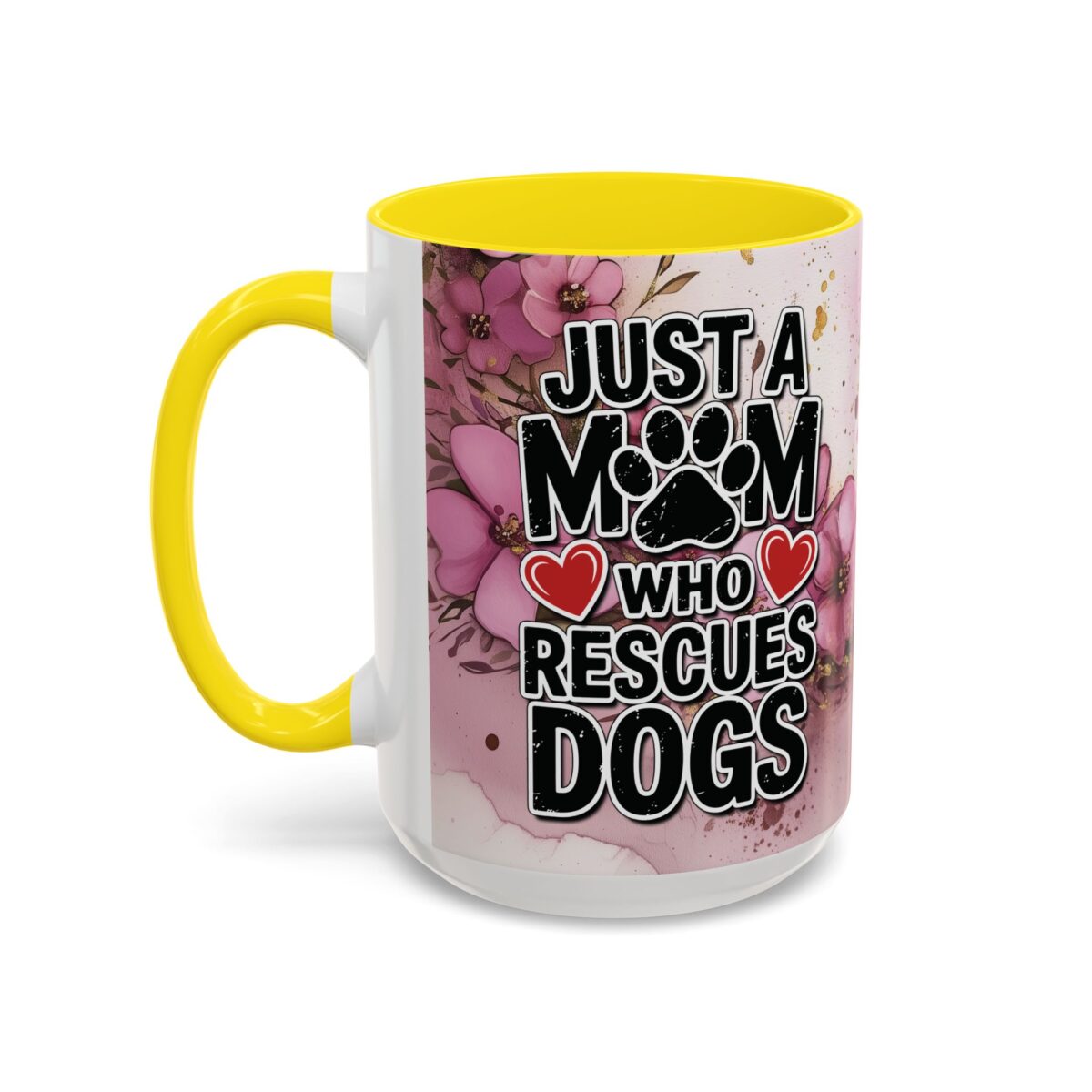 Ceramic mug with pink floral background, featuring bold text 'JUST A MOM WHO RESCUES DOGS' and a yellow handle.
